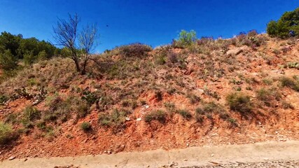 Texas Panhandle is characterized by dramatic canyon landforms, primarily due to the erosive power of rivers and wind over millions of years.