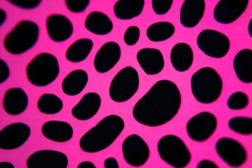 Obraz premium Vivid Pink Surface with Organic Shaped Black Cutouts Creating a Striking Abstract Pattern