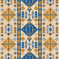 Desert echoes in indigo and sand, bold tribal-inspired design features angular blue and gold patterns on a beige backdrop.