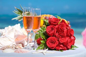 Celebrate love with roses, champagne, and seaside beauty. Perfect for wedding or engagement settings.
