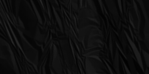 Wrinkled paper creased black crumpled texture. Black crumpled and top view textures can be used for background of text or any contents.	
