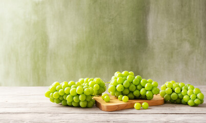 Shine Muscat, Green grapes on a cutting board