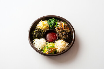Ingredients for bibimbap, red pepper paste and various vegetables