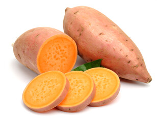 Sweet potatoes showing its orange inside on white background