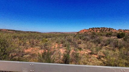 Texas Panhandle is characterized by dramatic canyon landforms, primarily due to the erosive power of rivers and wind over millions of years.