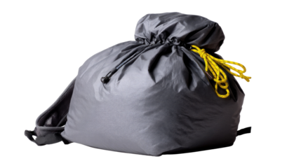 Adventurous Pack: A meticulously crafted close-up of a sturdy, compact backpack, designed for exploration and adventure, rests against a clean background.