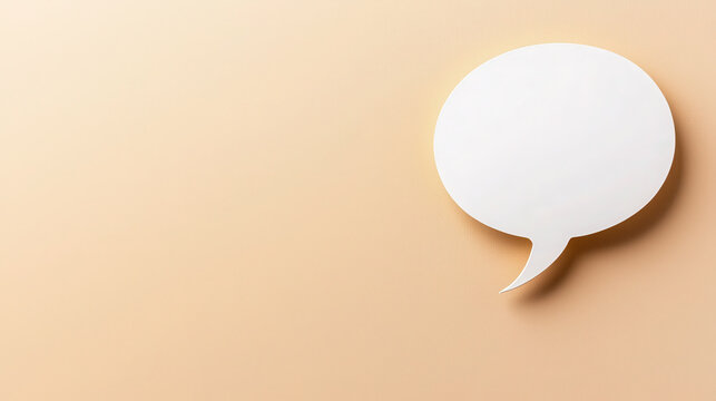 Blank speech bubble on soft beige background creates minimalist and modern design, perfect for communication themes