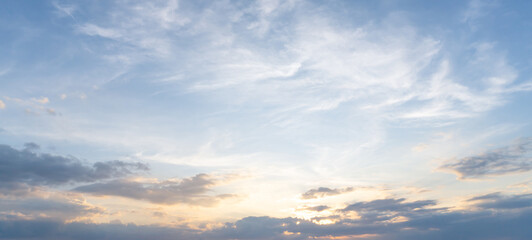 Beautiful morning or evening blue and orange sky with cloudy while sunsets or sunrises taken at the sea used as natural blackground texture