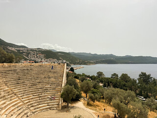 Ancient theater overlooking the beautiful coastline near a small town