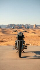 Fototapeta premium Classic motorcycle mockup placed in a dramatic desert setting, featuring sandy terrain and warm tones. Perfect for adventure themes and rugged lifestyle branding.