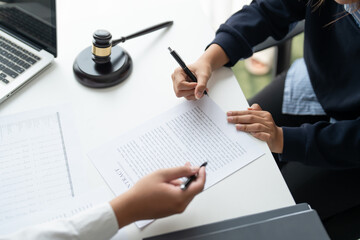 Lawyer businessman working with lawbook in office or courtroom Legal counsel with gavel and legal...