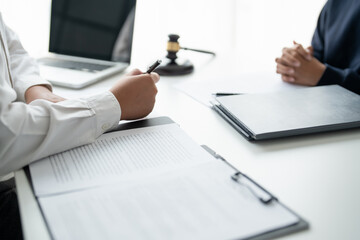 Lawyer businessman working with lawbook in office or courtroom Legal counsel with gavel and legal...