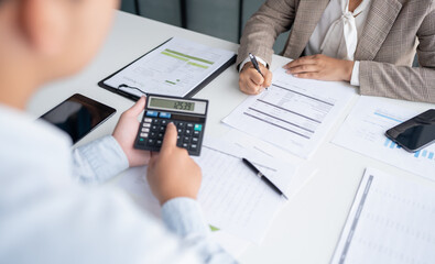 business man Auditor or internal revenue service staff checking annual financial statements company...