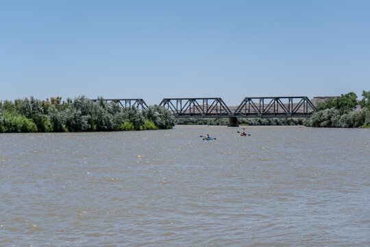 Kayakers on the Green River Near Bridge in Utah