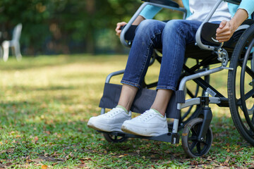 Fototapeta premium Depressed sad asian woman in wheelchair&nbsp;lonely disabled adult