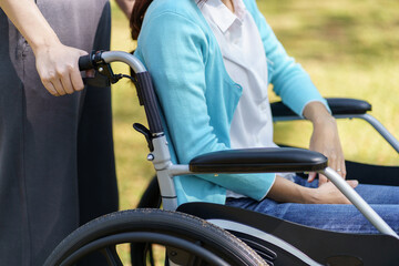 Obraz premium Depressed sad asian woman in wheelchair&nbsp;lonely disabled adult