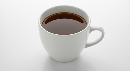 Obraz premium A white ceramic mug filled with dark liquid, likely coffee or tea, sits on a plain white surface.