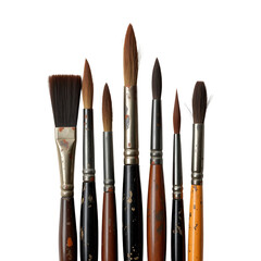 Fototapeta premium Grouping of well used paintbrushes in a variety of sizes are presented against a stark black backdrop highlighting artistry, transparent background