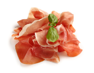 Slices of tasty prosciutto with basil on white background