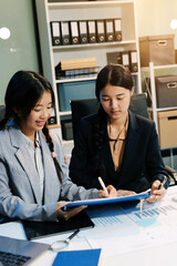 Accounting company provide finance and taxation planning for profitable cash flow, Auditor and accountant team working in office, analyze financial data and accounting record with calculator.Insight