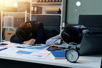 Asian women are stressed while working on laptop, Tired asian businesswoman with headache at...