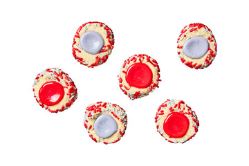 Six festive sugar cookies with red and silver sprinkles and colorful icing dots isolated on...
