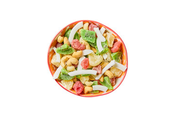 Colorful bowl of mixed dried fruits and nuts including kiwi cashews and coconut isolated on...