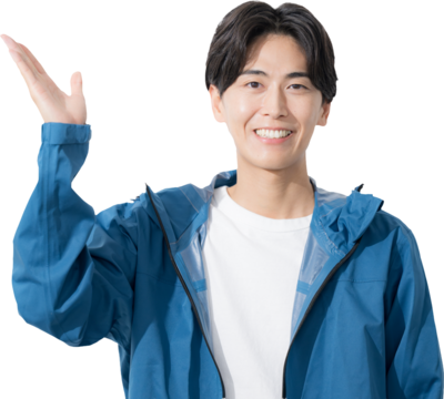 スポーツウェアで指差しするオススメポーズの若い男性　カメラ目線