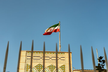 Iranian Embassy in Qatar, Doha,. concept of sanctions pressure on the iran government. Iranian flag...