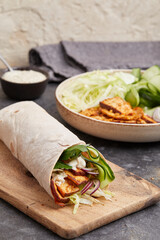 Tofu dürüm wrap with vegan yogurt sauce