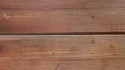 Textured wooden surface with rich brown tones, showcasing natural grain patterns and knots, ideal...