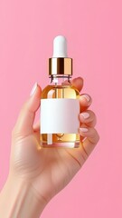 A woman's hand holds a glass dropper bottle with golden serum. This product mockup, featuring a blank white label for cosmetic branding, is elegantly presented against a vibran