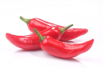 Red chili pepper isolated on a white background.