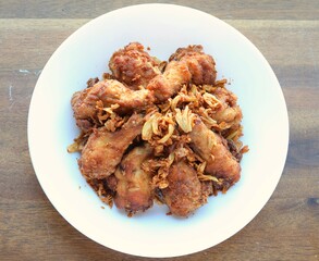 Golden brown fried chicken drumsticks