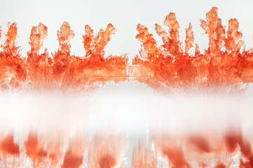 A macro photograph of vividly red, lab-grown crystals, showcasing their intricate geometric...