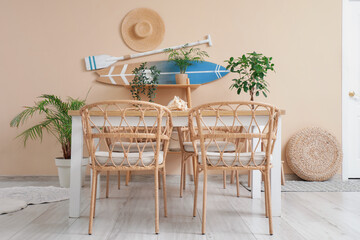 Dining table and surfboard with paddle