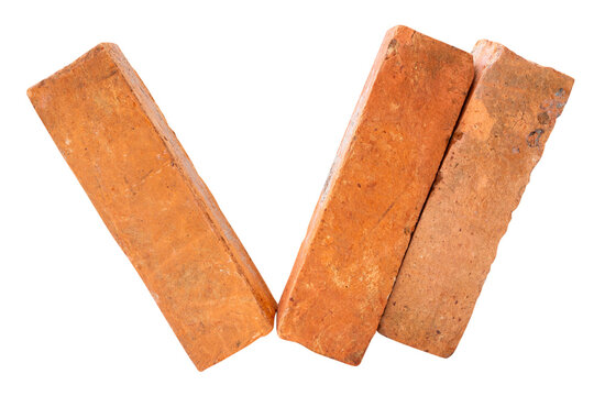 Side view of three cracked old red or orange bricks in stack isolated with clipping path in png file format
