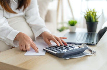 Human use calculator and calculate bills and paying bill, credit card, tax and vat, payment,...