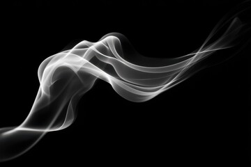 Fototapeta premium Abstract smoke swirl background on black backdrop.