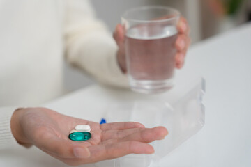 girl holding medicine and take medicine, pain, cure disease, sterilize, take vitamin, sedative,...