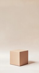 Beige cube podium against light beige background