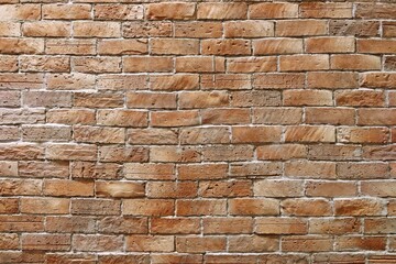 Uneven brick wall texture background