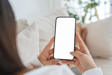 Human working on modern smartphone with blank white mobile screen for advertising, mockup,...