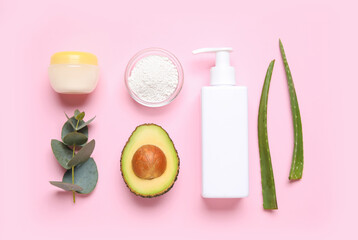 Composition with natural cosmetic products and ingredients on pink background