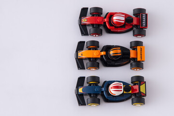 Naklejka premium LEGO Toy Ferrari Mclaren racing Formula 1 Car. Set little brick cars Model copy space. Ukraine, Kyiv - June 8, 2025