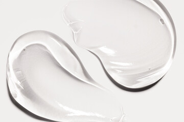 cosmetic sample of transparent gel texture on light background