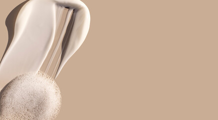 creamy texture of cosmetic samples on a pastel beige background