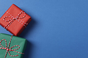 Bright Christmas decorations and gifts on a blue background