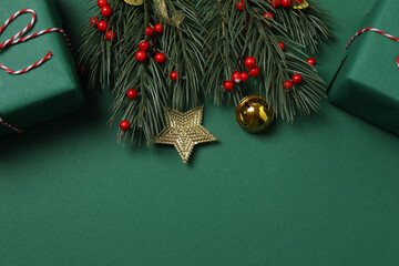 Bright Christmas decorations and gifts on classic green background