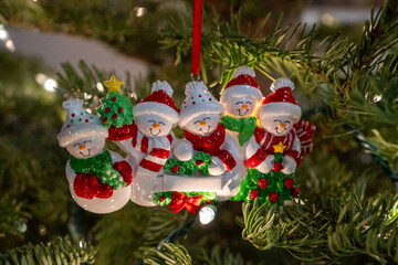 Festive holiday decorations featuring cozy Christmas lights, ornaments, and pine branches creating a warm, nostalgic winter ambiance perfect for seasonal celebrations and winter-themed visuals.